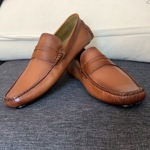 Men’s brown loafers. Size 10.5 and never been worn.